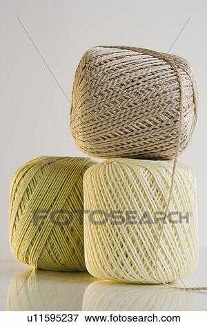 Stock Photo - Studio shot of balls of yarn. Fotosearch