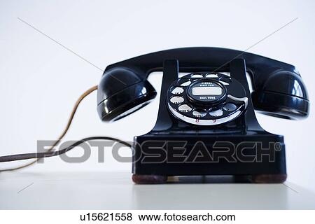 Studio shot of rotary phone View Large Photo Image Stock Photo - Studio shot of rotary phone. Fotosearch