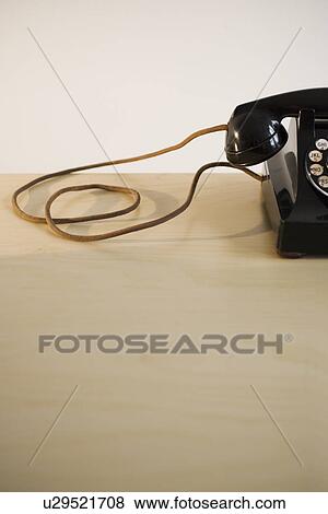 Studio shot of rotary phone View Large Photo Image Stock Photo - Studio shot of rotary phone. Fotosearch
