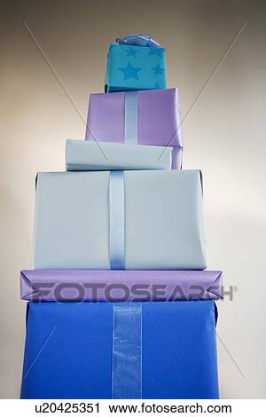 Studio shot of stacked gifts View Large Photo Image Stock Image - Studio shot of stacked gifts. Fotosearch