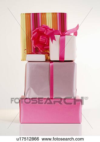 Stock Photograph - Studio shot of stacked gifts. Fotosearch