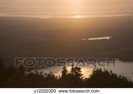 Stock Image - Sunset from Cadillac Mountain in Maine. Fotosearch