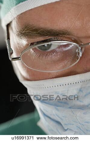 Stock Image - Surgeon at work. Fotosearch