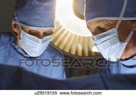 Stock Photography - Surgeons at work. Fotosearch