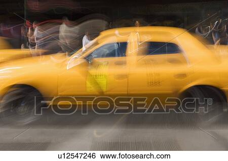 Taxi cab on street in New York NY View Large Photo Image Stock Photograph - Taxi cab on street in New York NY. Fotosearch