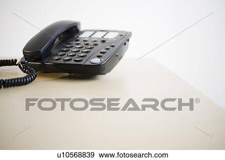 Stock Photo - Telephone on table. Fotosearch