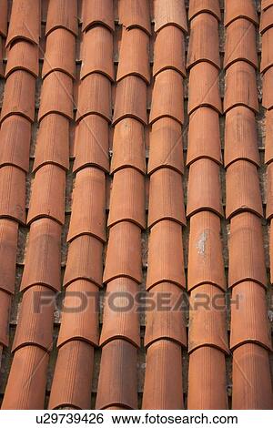 Stock Photograph - Terracotta roof tiles Italy. Fotosearch