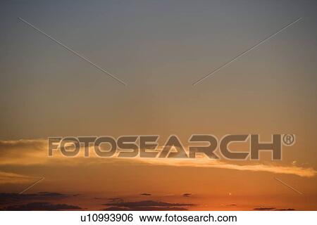 Stock Photograph - Thin band of clouds. Fotosearch
