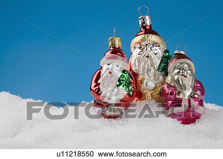 Three Santa Claus Christmas ornanaments View Large Photo Image Stock Image - Three Santa Claus Christmas ornanaments. Fotosearch