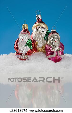 Three Santa Claus Christmas ornanaments View Large Photo Image Stock Photography - Three Santa Claus Christmas ornanaments. Fotosearch