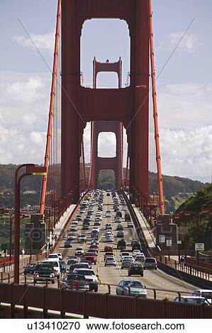 Stock Image - Traffic on the Golden Gate Bridge San Francisco California USA. Fotosearch