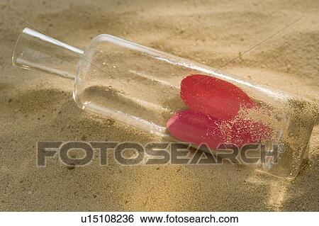 Stock Photograph - Valentine message in a bottle. Fotosearch