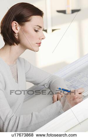 Stock Photo - Woman at drawing board. Fotosearch