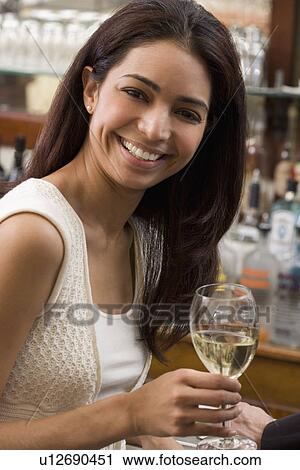 Woman drinking wine at bar View Large Photo Image Stock Image - Woman drinking wine at bar. Fotosearch