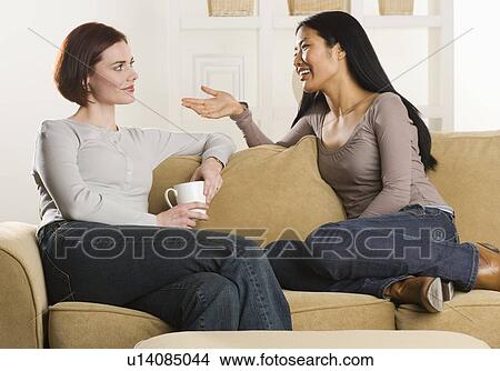 Woman friends talking View Large Photo Image Picture - Woman friends talking. Fotosearch