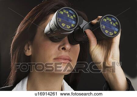 Woman looking through binoculars View Large Photo Image Stock Image - Woman looking through binoculars. Fotosearch
