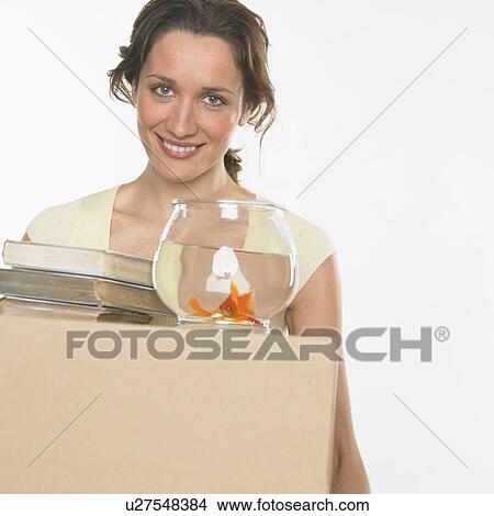 Woman on moving day View Large Photo Image Picture - Woman on moving day. Fotosearch