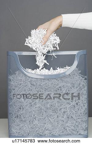 Woman using shredding machine View Large Photo Image Stock Image - Woman using shredding machine. Fotosearch
