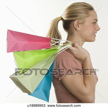 Woman with lots of shopping bags View Large Photo Image Stock Image - Woman with lots of shopping bags. Fotosearch