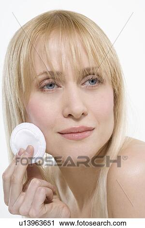 Woman with powder puff View Large Photo Image Stock Image - Woman with powder puff. Fotosearch