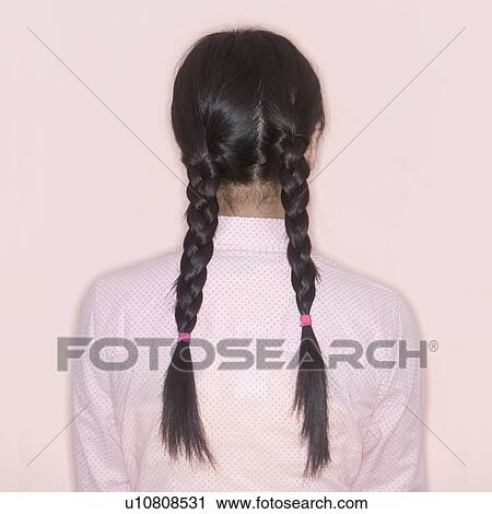 Woman's back with braids View Large Photo Image Stock Image - Woman's back with braids. Fotosearch