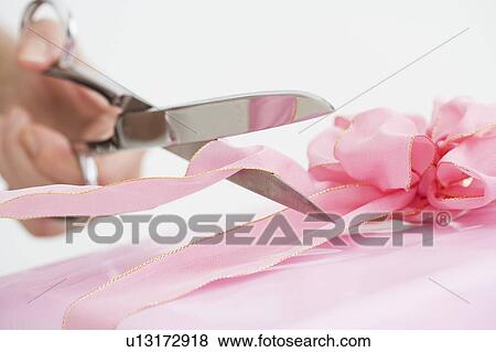 Wrapping a present View Large Photo Image Stock Photo - Wrapping a present. Fotosearch
