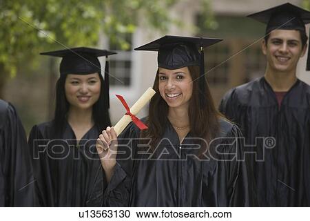 African female college graduate holding diploma View Large Photo Image Stock Image - African female college graduate holding diploma. Fotosearch