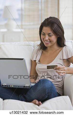 Asian woman shopping online View Large Photo Image Stock Image - Asian woman shopping online. Fotosearch