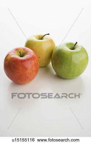 Assorted apples on table View Large Photo Image Stock Photograph - Assorted apples on table. Fotosearch