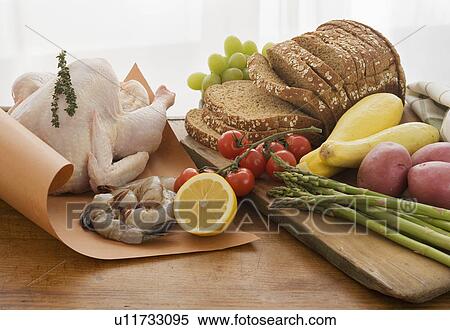 Assorted food groups on table View Large Photo Image Stock Photography - Assorted food groups on table. Fotosearch