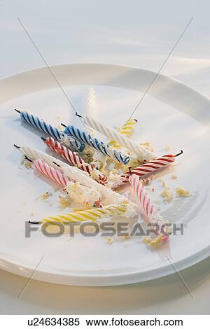 Birthday candles and crumbs on plate View Large Photo Image Stock Photography - Birthday candles and crumbs on plate. Fotosearch