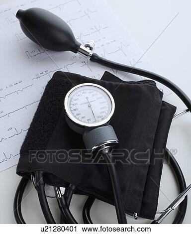 Blood pressure cuff on heart rate printout View Large Photo Image Stock Image - Blood pressure cuff on heart rate printout. Fotosearch