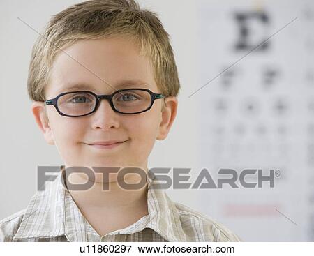 Boy wearing eyeglasses View Large Photo Image Stock Photo - Boy wearing eyeglasses. Fotosearch