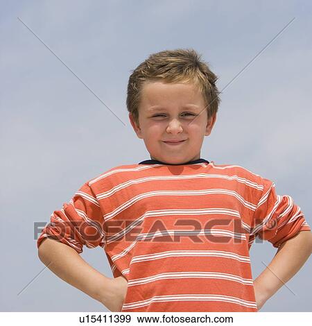 Boy with hands on hips View Large Photo Image Stock Photo - Boy with hands on hips. Fotosearch