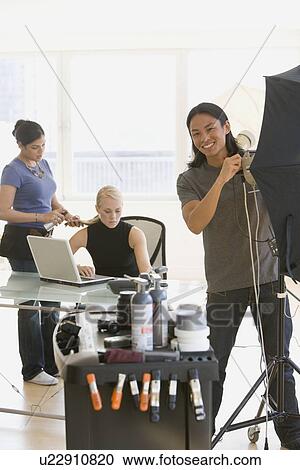 Business photo shoot in studio View Large Photo Image Stock Image - Business photo shoot in studio. Fotosearch