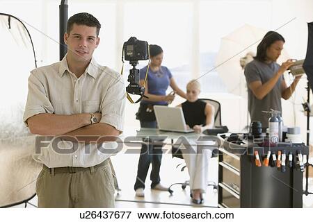 Stock Photo - Business photo shoot in studio. Fotosearch