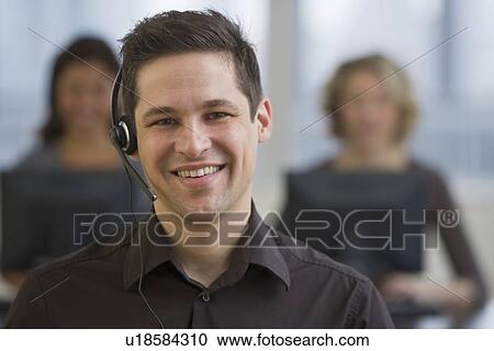 Businessman wearing headset View Large Photo Image Stock Image - Businessman wearing headset. Fotosearch