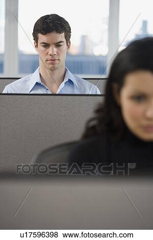 Businesspeople working in cubicles View Large Photo Image Stock Photo - Businesspeople working in cubicles. Fotosearch