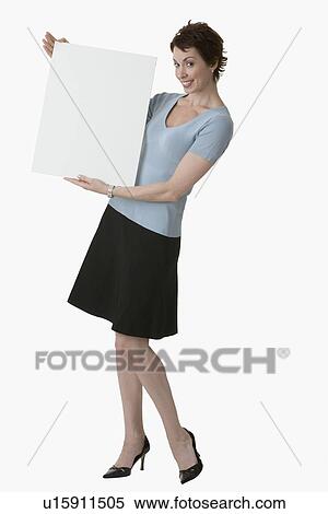 Stock Photography - Businesswoman holding blank sign. Fotosearch