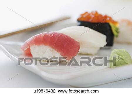 Close up of assorted sushi on plate View Large Photo Image Stock Image - Close up of assorted sushi on plate . Fotosearch