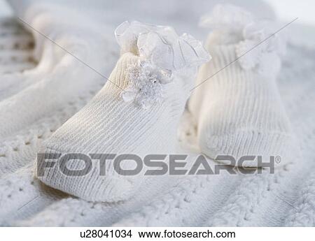 Picture - Close up of baby booties. Fotosearch