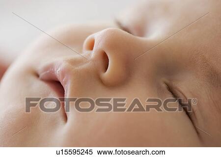 Stock Photography - Close up of baby sleeping. Fotosearch
