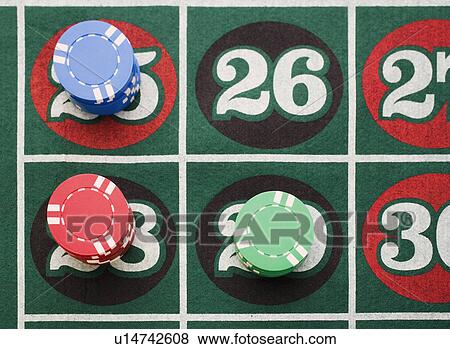 Stock Photo - Close up of bets on roulette table. Fotosearch