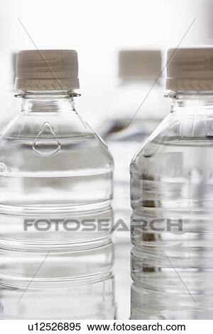 Stock Photography - Close up of bottled water. Fotosearch