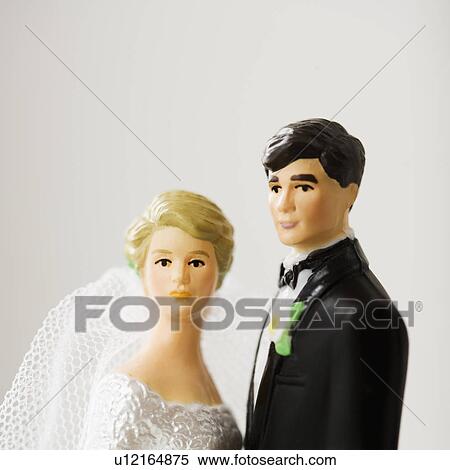 Close up of bride and groom figurines View Large Photo Image Stock Photography - Close up of bride and groom figurines. Fotosearch