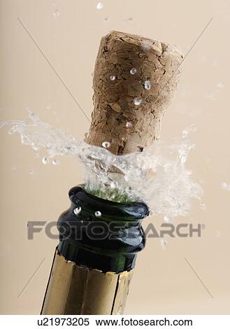 Close up of champagne cork popping View Large Photo Image Stock Photography - Close up of champagne cork popping. Fotosearch