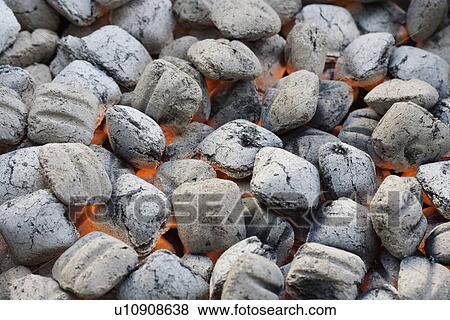 Close up of charcoal briquette fire View Large Photo Image Stock Photo - Close up of charcoal briquette fire. Fotosearch