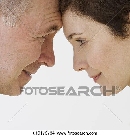 Close up of couple touching foreheads View Large Photo Image Picture - Close up of couple touching foreheads. Fotosearch
