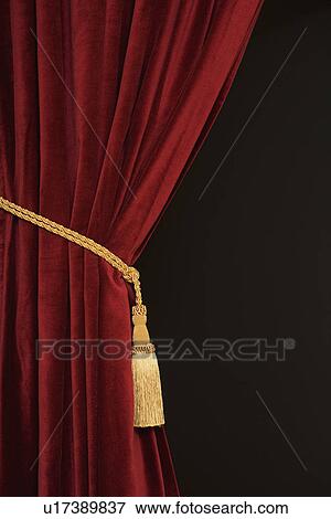 Close up of curtain and tieback View Large Photo Image Stock Photo - Close up of curtain and tieback. Fotosearch