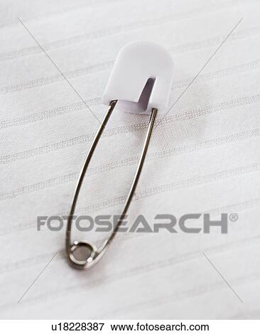 Stock Photo - Close up of diaper pin. Fotosearch